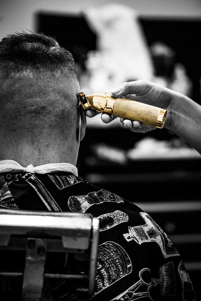 Introductory photo of a barbershop in Aurora with trendy men's hairstyles